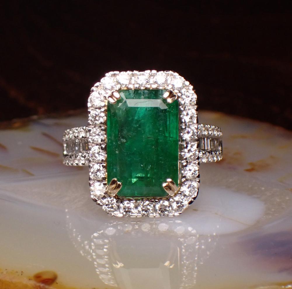 EMERALD, DIAMOND AND FOURTEEN KARAT