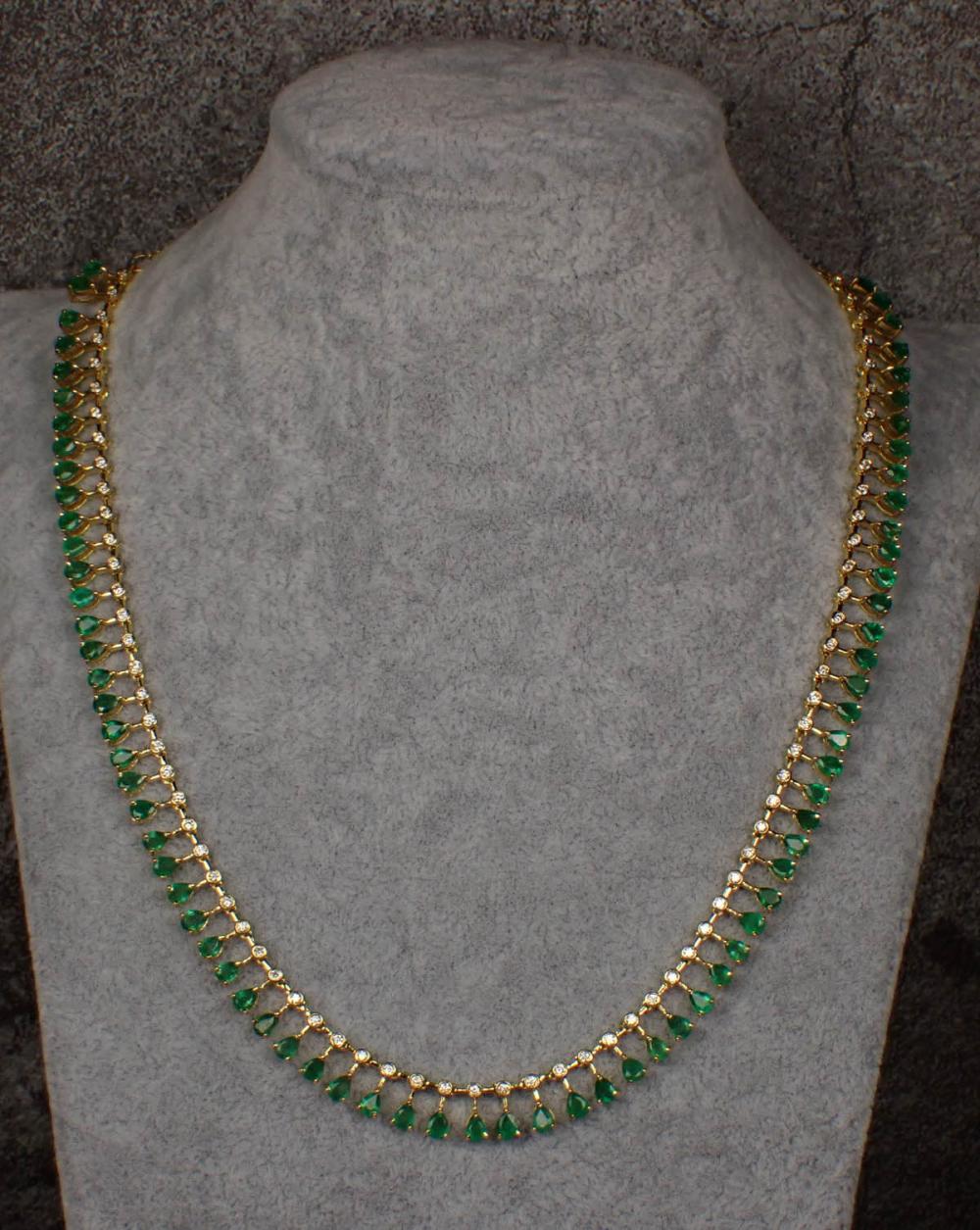 EMERALD, DIAMOND AND FOURTEEN KARAT