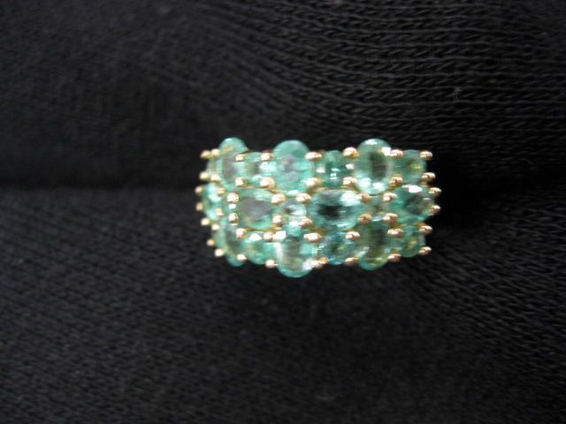 Emerald Ring triple row of gems