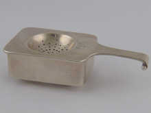 Emmy Roth. A hand raised silver