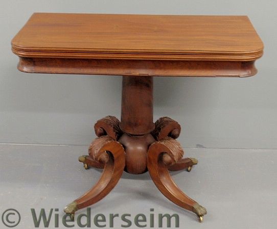 Empire mahogany card table with a