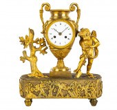 EMPIRE STYLE GILT BRONZE CLOCK