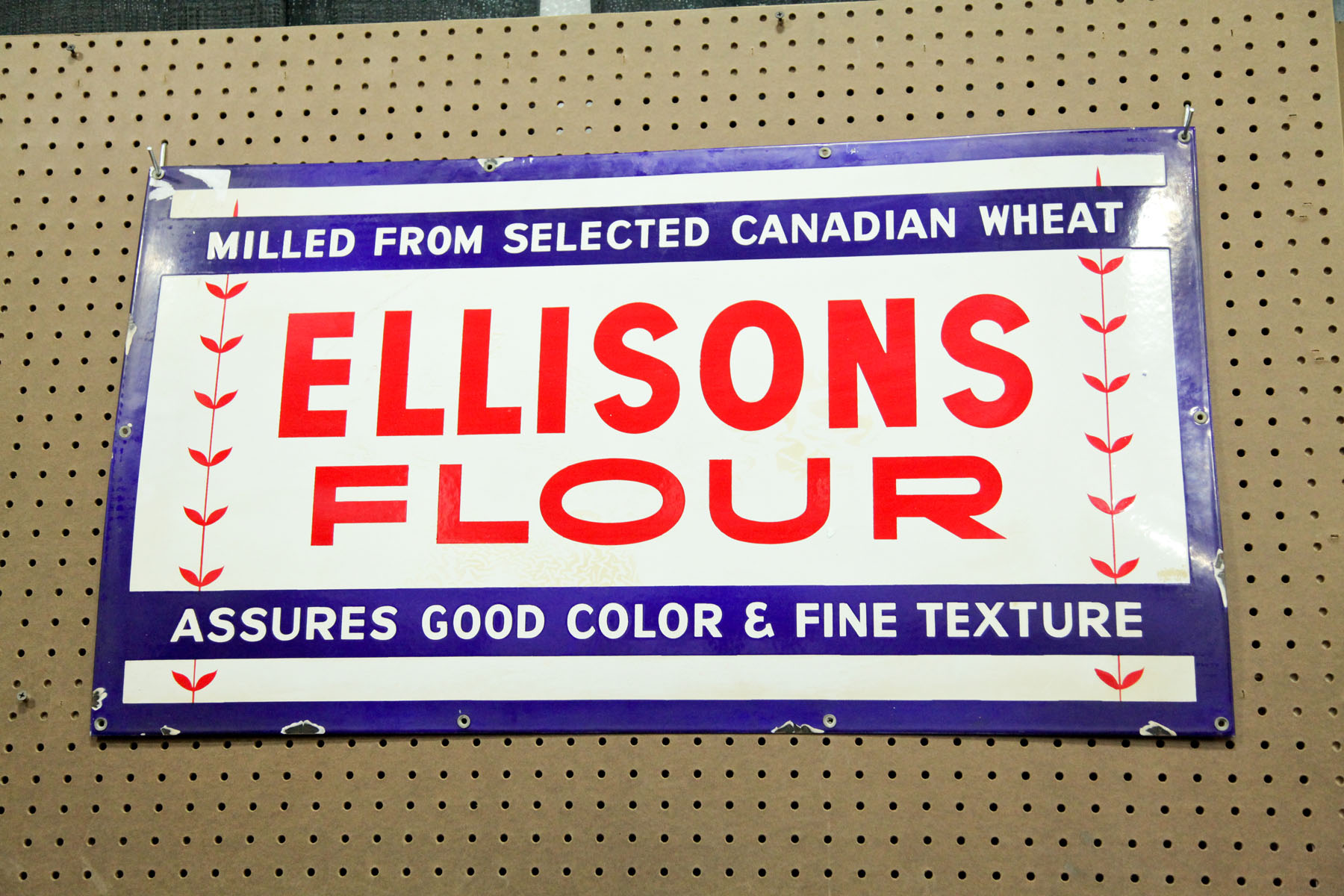 ENAMELED ADVERTISING SIGN. 