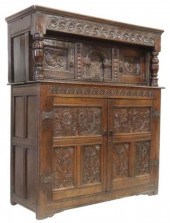 ENGLISH CARVED OAK COURT CUPBO