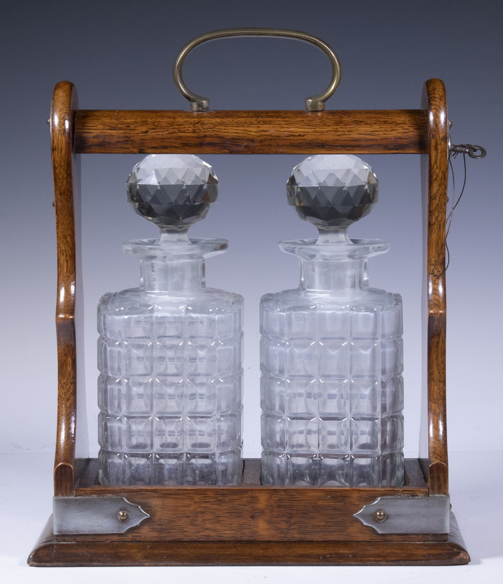 ENGLISH OAK TANTALUS WITH BOTTLES