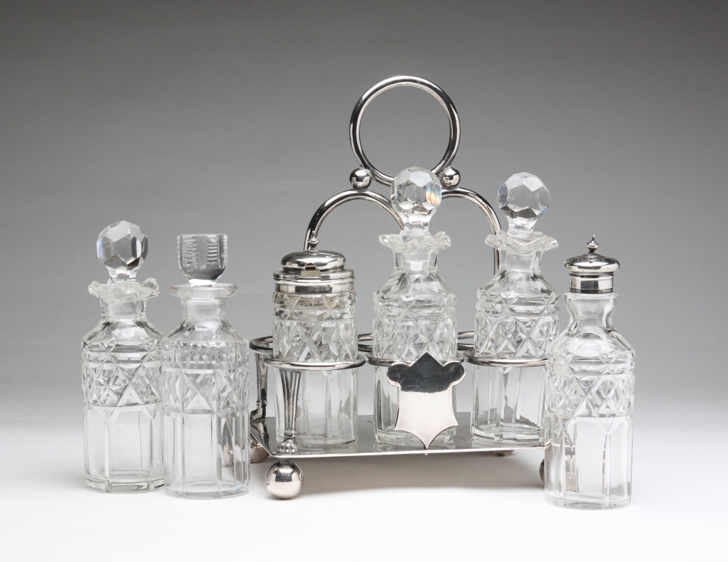 ENGLISH SILVER CASTOR SET. Late
