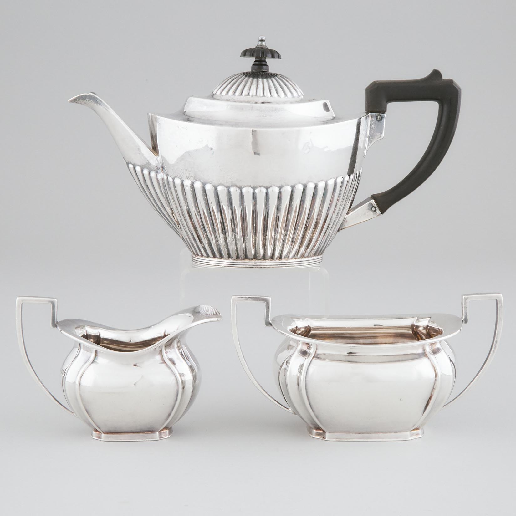 English Silver Teapot and a Cream