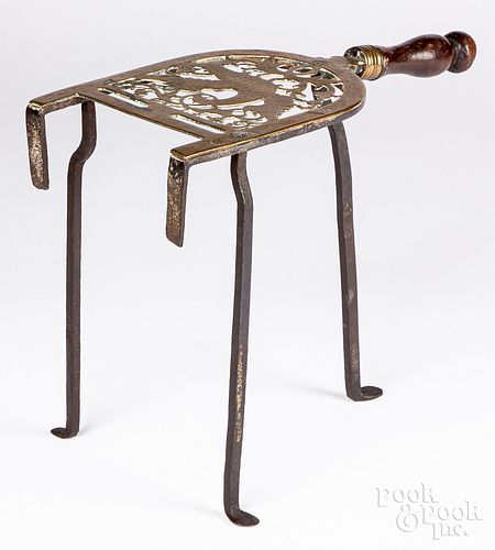 ENGRAVED BRASS AND IRON TRIVET,