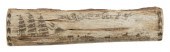 * ENGRAVED PIECE OF JAWBONE HE