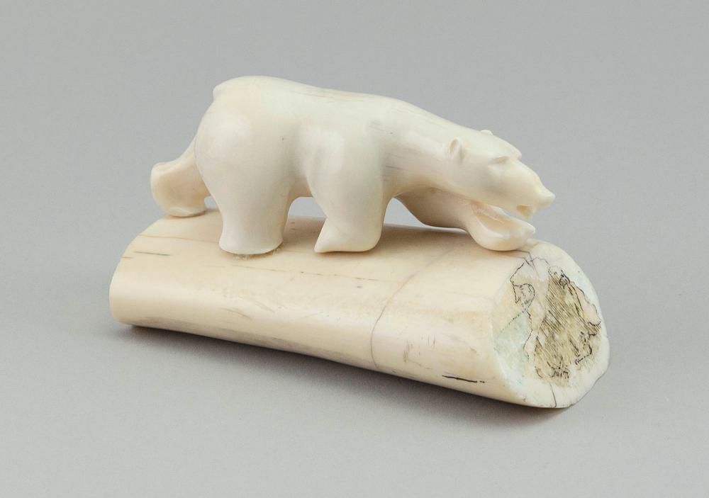 ESKIMO WALRUS IVORY CARVING OF A