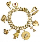 ESTATE 14KT GOLD CHARM BRACELE