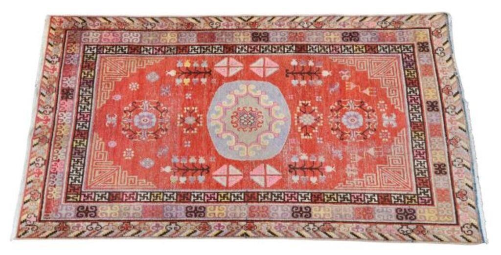 ESTATE HAND TIED KHOTAN RUG,