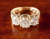 ESTATE THREE-STONE DIAMOND AND