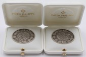 EXONUMIA. (2) PATEK PHILIPPE T