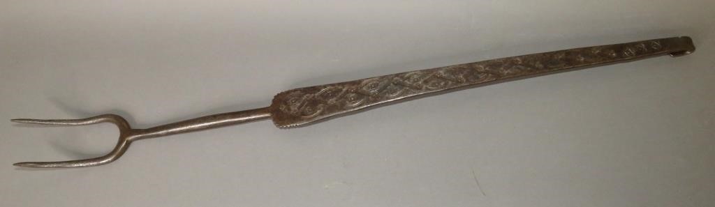 EXTENSIVELY TOOL DECORATED
