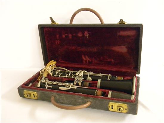 F. Barbier brown wooden clarinet in