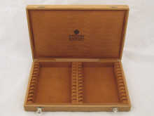 Faberge. A suede lined oak box