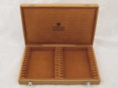 Faberge. A suede lined oak box