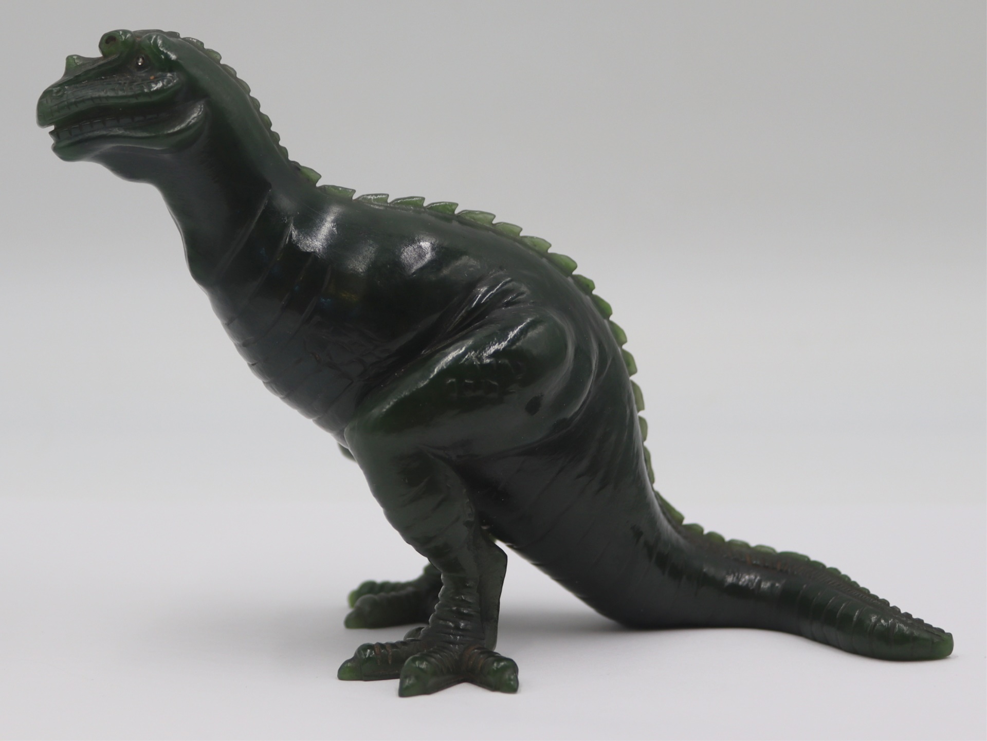 FABERGE. CARVED NEPHRITE DINOSAUR