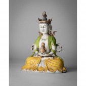 FAMILLE ROSE SEATED FIGURE OF