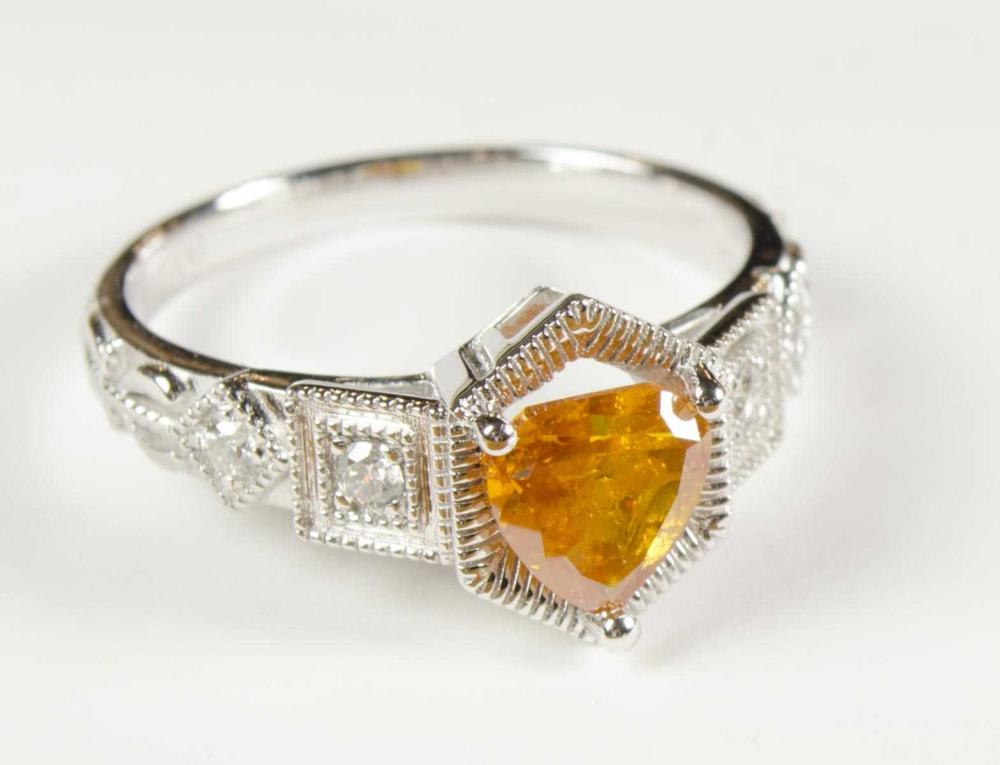 FANCY DIAMOND AND PLATINUM RING