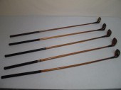 Fancy face wood shaft golf clu