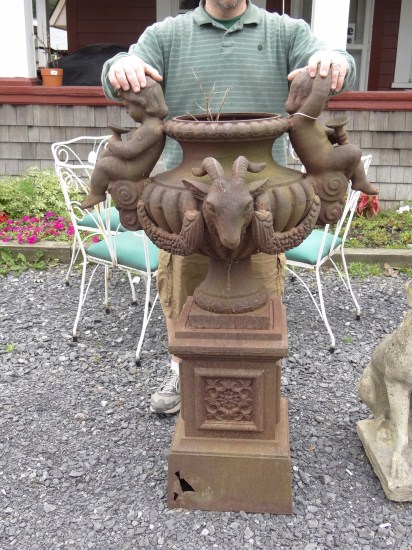 Fancy two part cast iron urn. 47