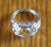 FANCY YELLOW DIAMOND AND FOURT