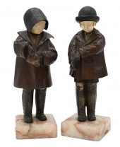 FATH, PAIR OF PATINATED BRONZE