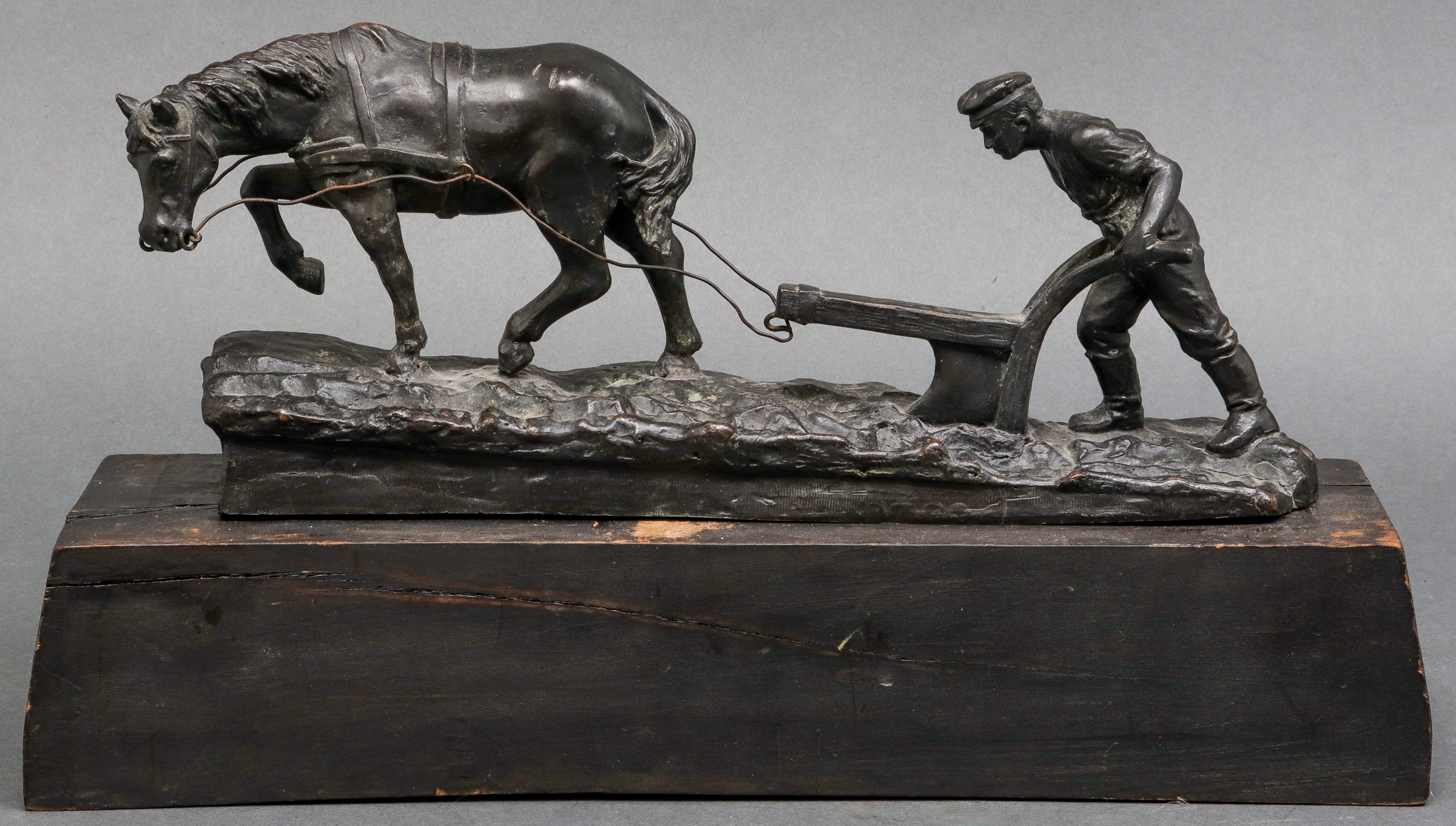 FAUX BRONZE PATINA PLOWMAN &