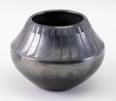 FEATHER DESIGN POTTERY JAR BY