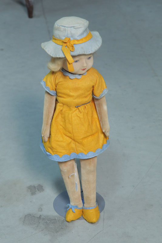 FELT DOLL. Felt girl with glass