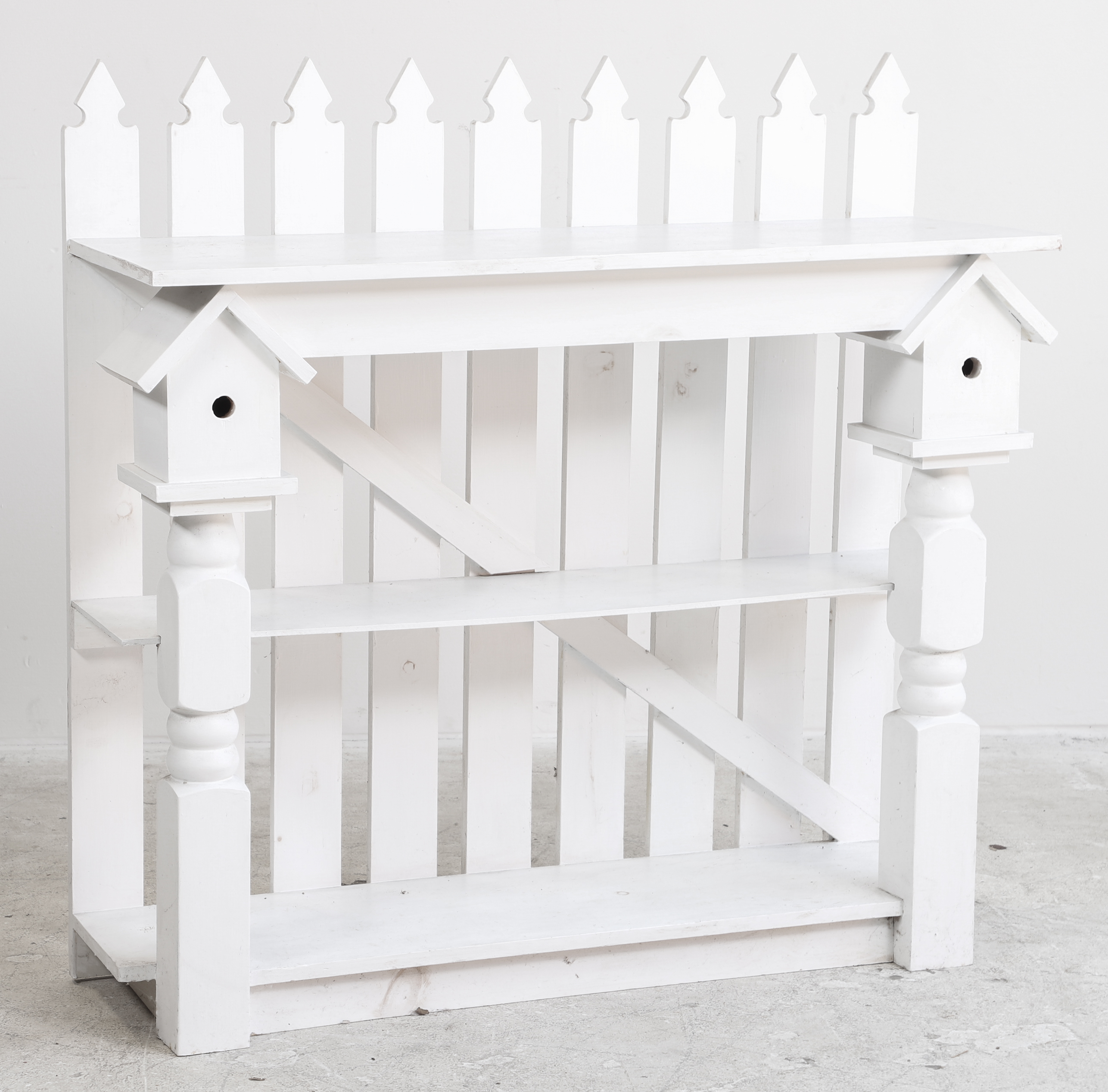 Fence and birdhouse form painted