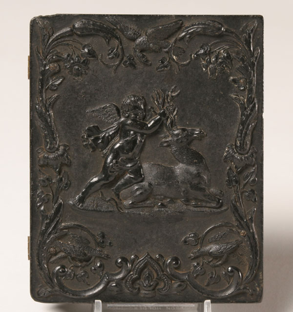 Ferrotype in gutta percha case;
