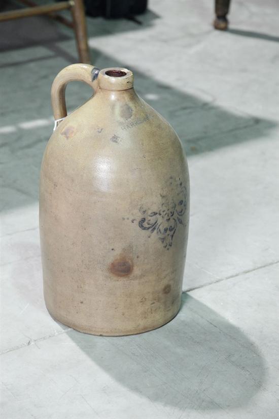 F.H. COWDEN STONEWARE JUG.
