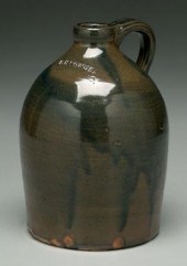 F.H. Cowden stoneware jug, run