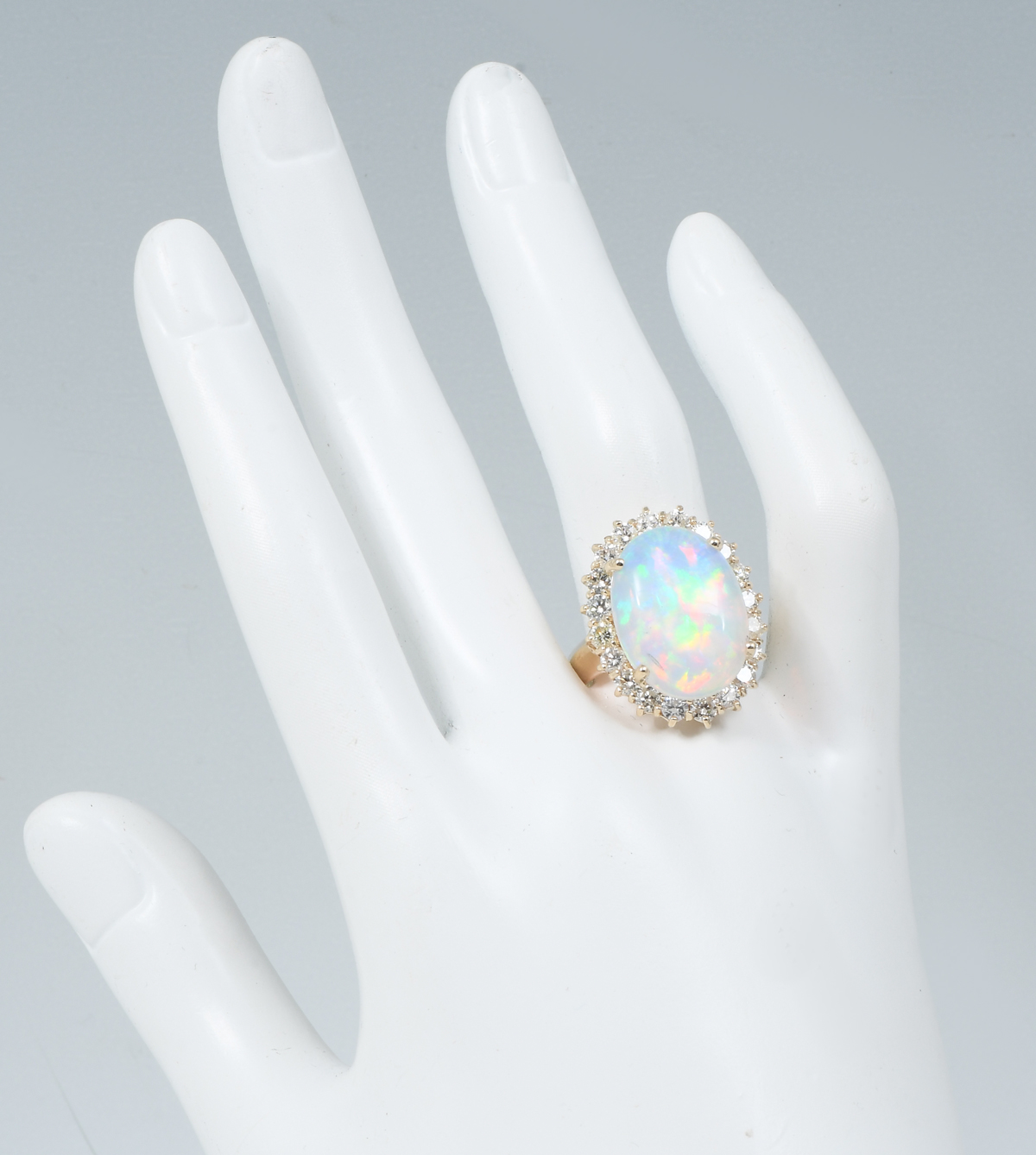 FIERY 14K 6.15 CT OPAL RING WITH