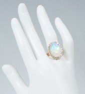 FIERY 14K 6.15 CT OPAL RING WI
