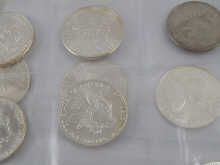 Fifteen American silver dollars