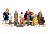 FIFTEEN CARVED AND POLYCHROMED