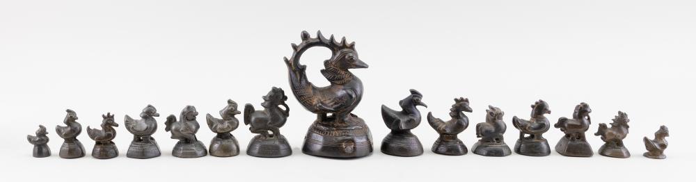 FIFTEEN CHINESE BRONZE OPIUM
