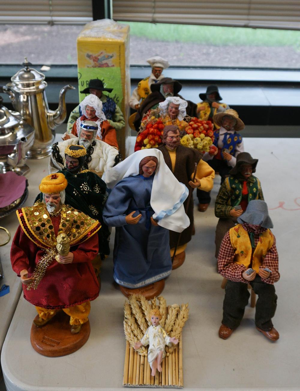 FIFTEEN FRENCH POTTERY AND CLOTH