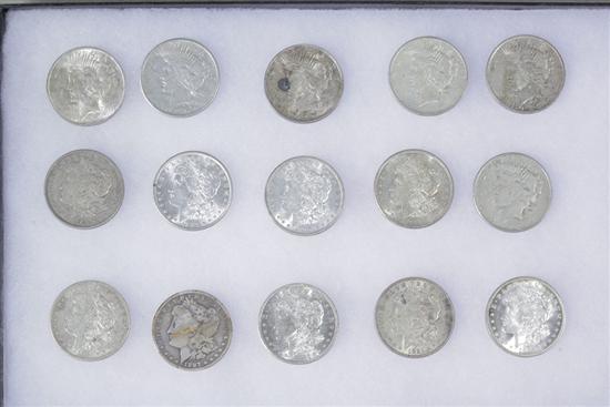 FIFTEEN SILVER DOLLARS. Including