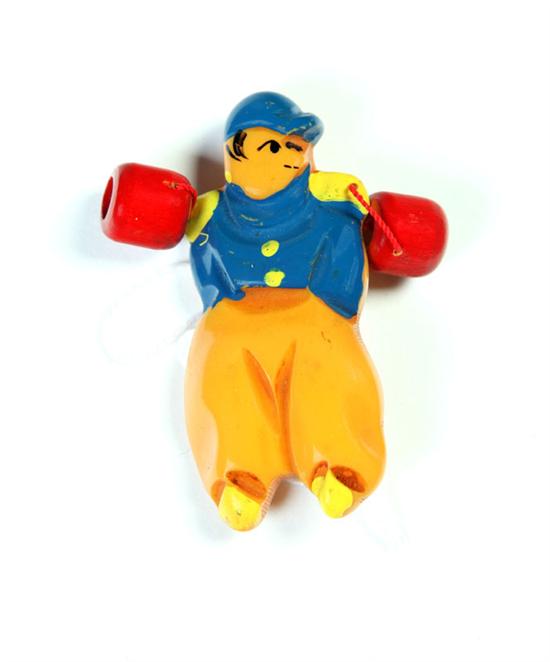 FIGURAL BAKELITE PAINTED PIN. 