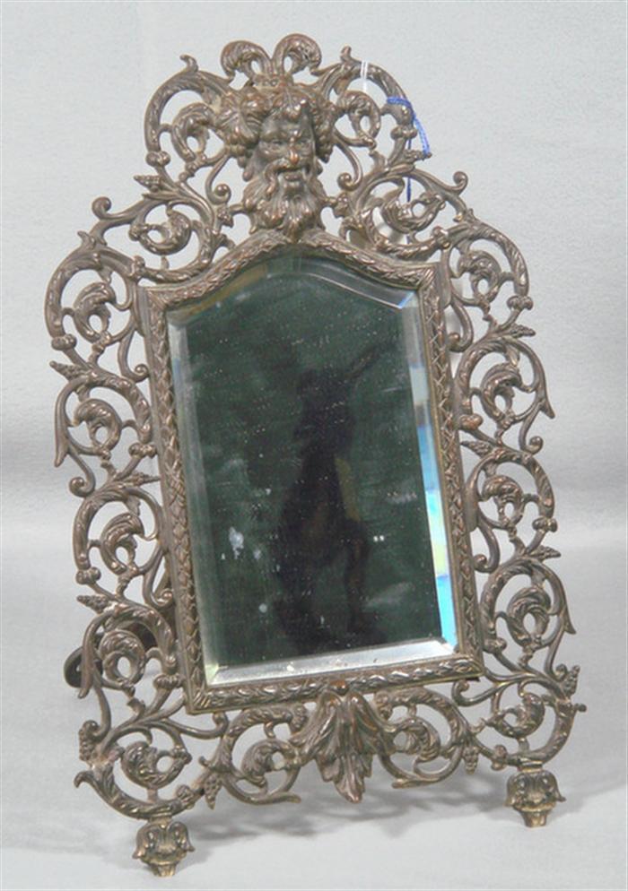 Figural brass bracket mirror,