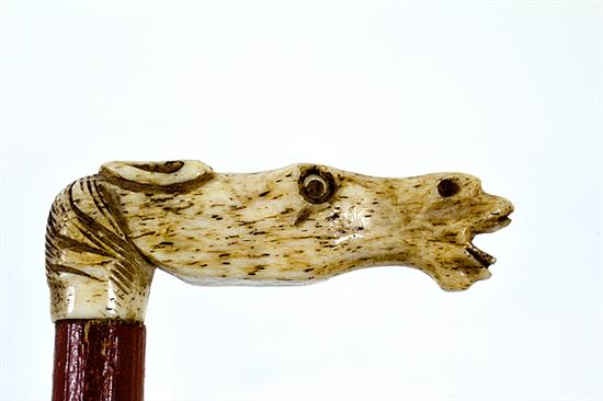 Figural carved bone riding crop