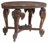 FIGURAL CARVED HARDWOOD OCCASI