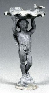 Figural lead birdbath, winged
