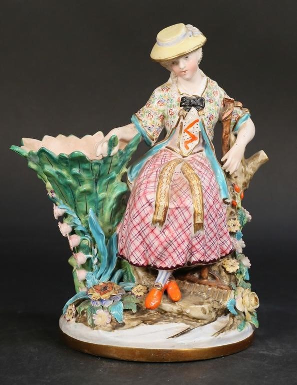 FIGURAL PORCELAIN SPILL VASE SEATED
