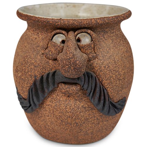 FIGURAL STONEWARE POTDESCRIPTION: A